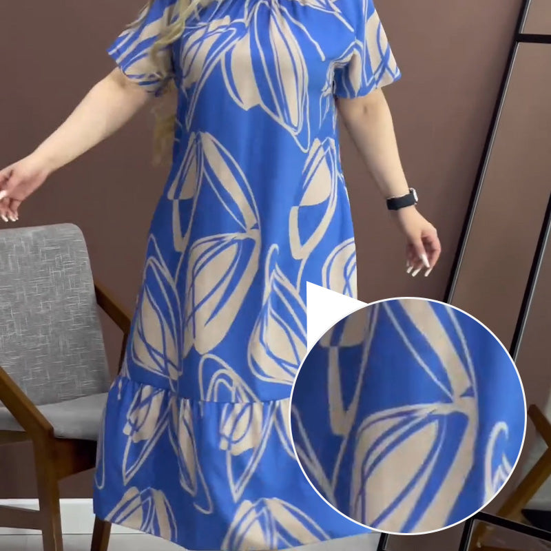 Robe élégante à col rond imprimée et fluide