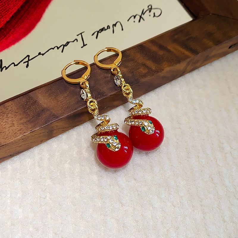 Boucles d'Oreilles Plaquées Or de Serpent avec Perles